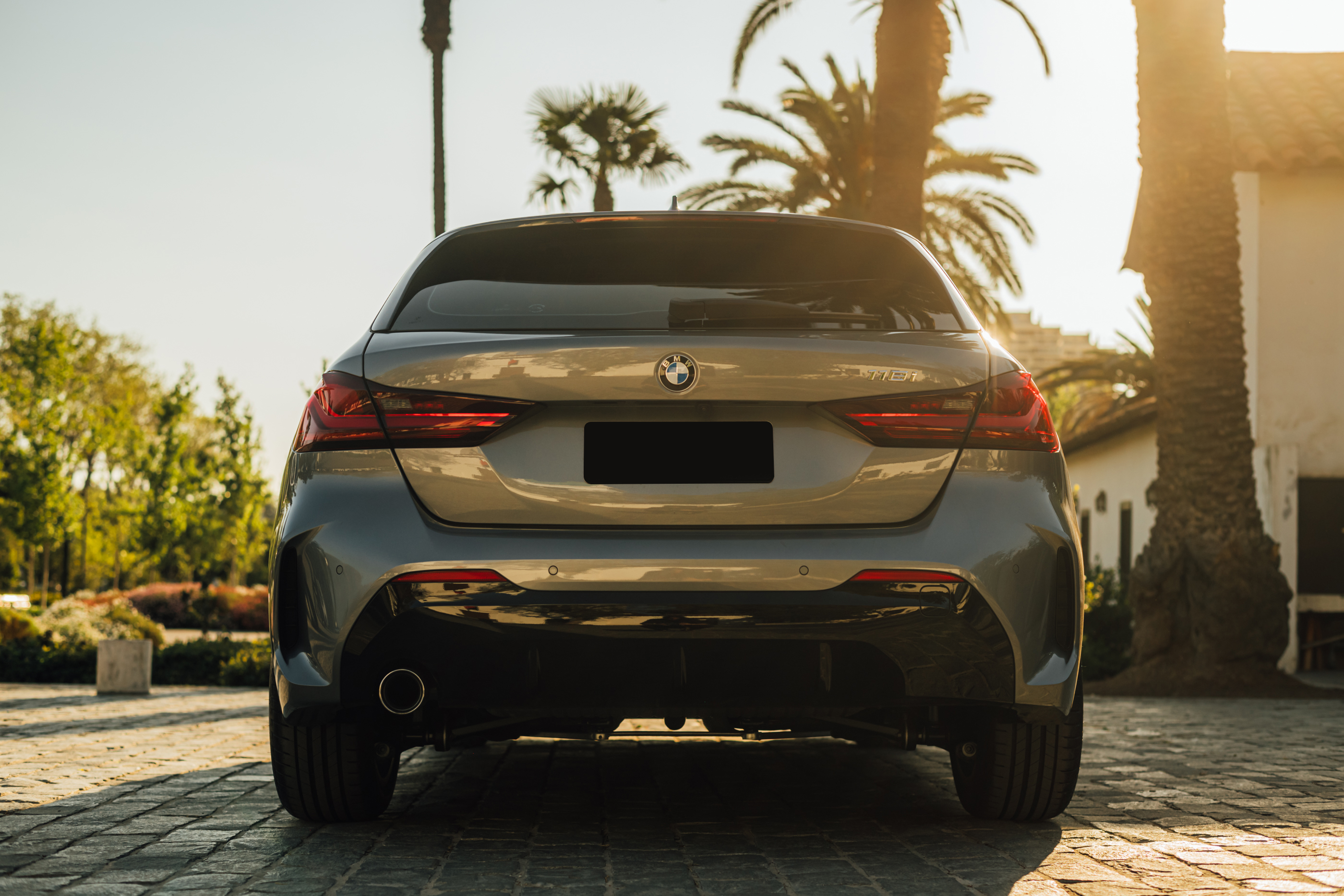 BMW 320i at sunset
